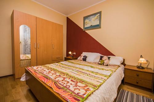 En eller flere senger på et rom på Apartment Gogić