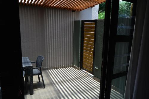 Ein Balkon oder eine Terrasse in der Unterkunft The Guesthouse 6 on Vrede