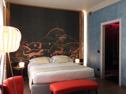 Postel nebo postele na pokoji v ubytování Hotel Firenze