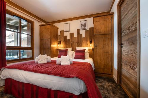 Postel nebo postele na pokoji v ubytování Superbe appart Arc 1950 4/6pers dans résidence hôtelière 5* - Skis aux pieds