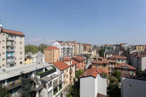 GuestHost - Piazzale Susa Bright Flat con Veranda