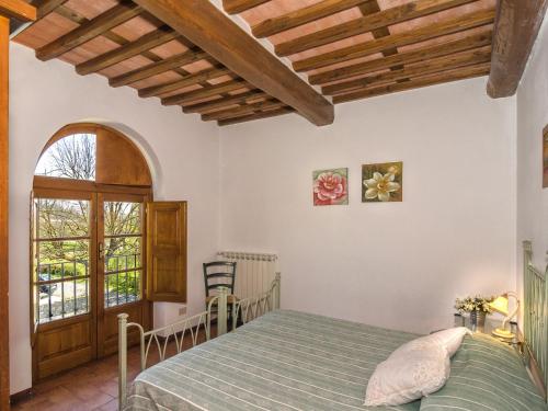 Ένα ή περισσότερα κρεβάτια σε δωμάτιο στο Holiday Home Giuseppe by Interhome