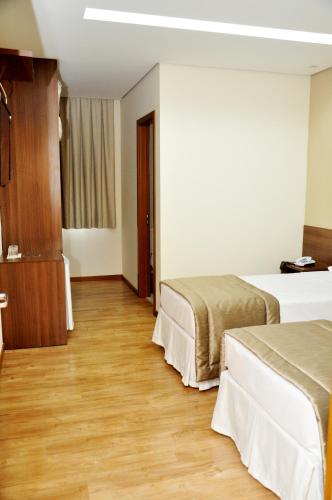 Postel nebo postele na pokoji v ubytování Hotel Mohave