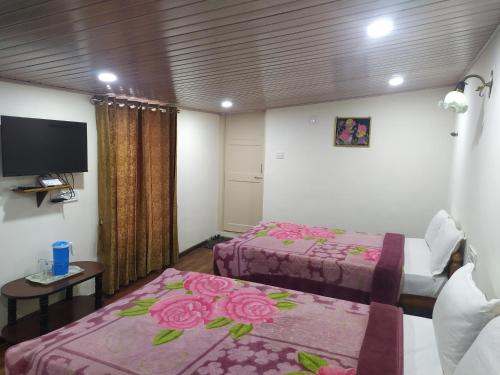 Postel nebo postele na pokoji v ubytování Heritage Holiday Home