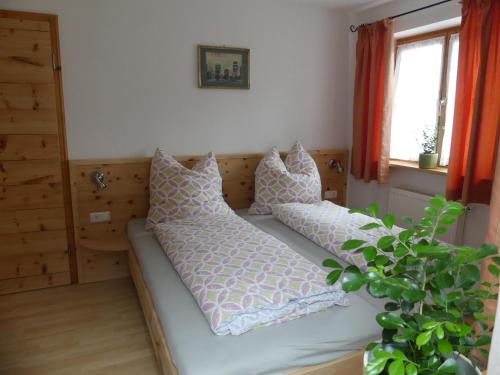 Postel nebo postele na pokoji v ubytování Ferienwohnung Max Fegg