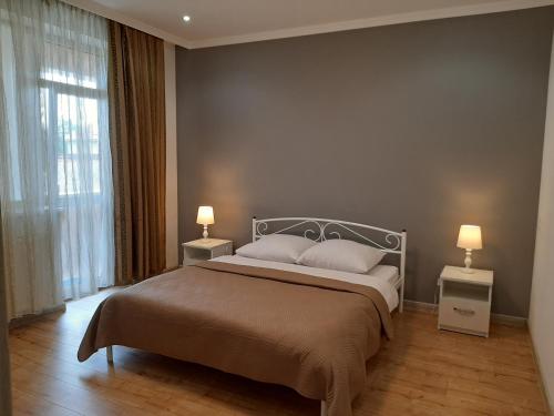 Tempat tidur dalam kamar di New !!! Modern Lux apartment in the city center with a terrace