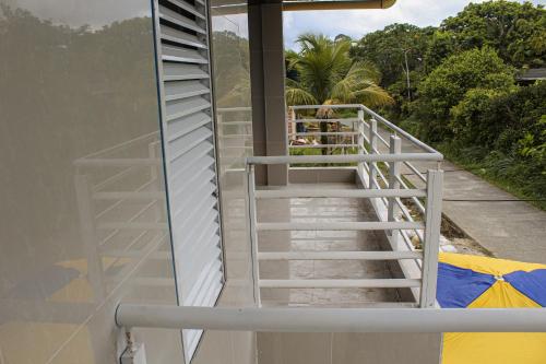 a staircase on the side of a building at Hotel Villa Lucy in Playa Ladrilleros