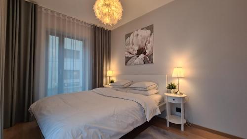 Postel nebo postele na pokoji v ubytování City Premium