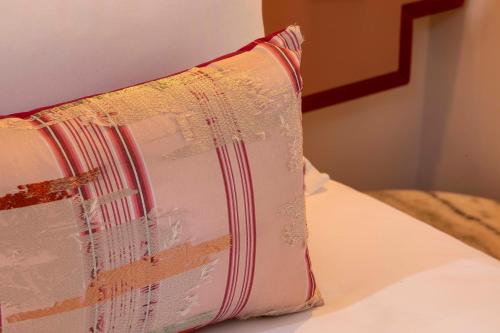 Postel nebo postele na pokoji v ubytování Hotel des Deux-Iles - Notre-Dame