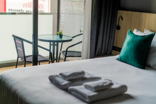 Postel nebo postele na pokoji v ubytování TK Bed