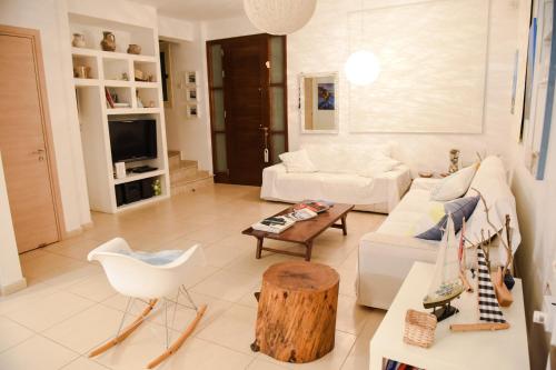 Zona de estar de Riverland beach villa