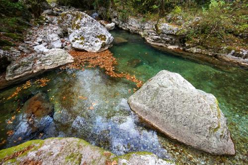 a group of rocks in a pool of water at Rodami in Kalentzi