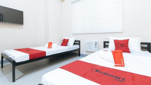 Katil atau katil-katil dalam bilik di RedDoorz Plus @ Torre De Manuel Residences 1