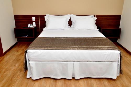 Postel nebo postele na pokoji v ubytování Hotel Mohave