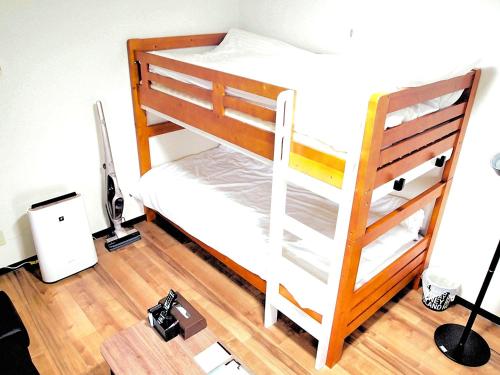 Postel nebo postele na pokoji v ubytování COCOSTAY Matoba#902 ココステイ マトバ#902 広島駅徒歩10分 10 min walk from Hirosima Station