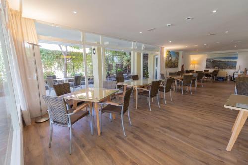 En restaurant eller et andet spisested på Apartamentos Tigaiga Suites