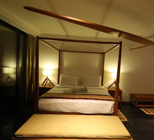 Lova arba lovos apgyvendinimo įstaigoje The Emerald Club ,Rajkot