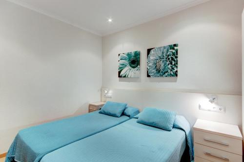 En eller flere senge i et værelse på Llevant 3 1 Centro Roses - Barneda Premium