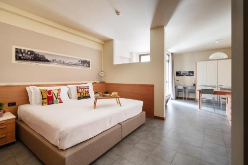 Tempat tidur dalam kamar di Hotel Borgo Brianteo