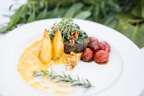 a plate of food on a white plate at Burkleigh House in Johannesburg