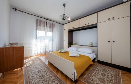 Posteľ alebo postele v izbe v ubytovaní Apartment Ante Kampor