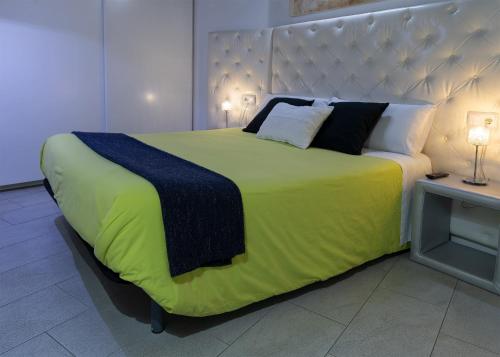 Katil atau katil-katil dalam bilik di Apartaments y Habitacions Entre Volcans