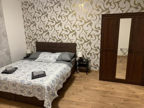 Postel nebo postele na pokoji v ubytování Apartmány TIME