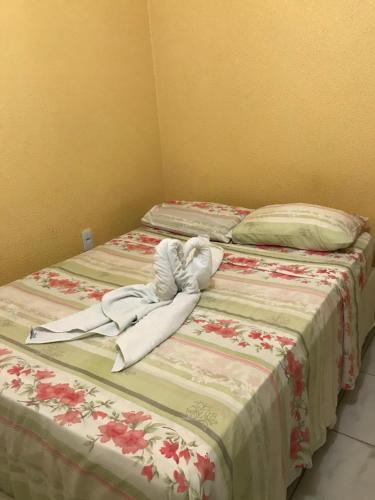 Postel nebo postele na pokoji v ubytování Green Flat Fortaleza