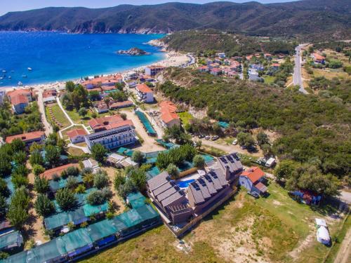 an aerial view of the resort and the beach at Hotel Palladium Sithonia in Kalamitsi