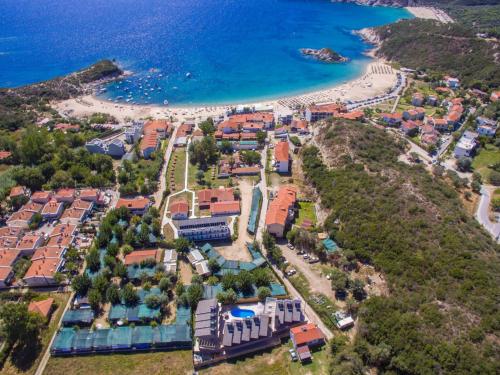 an aerial view of a resort near the beach at Hotel Palladium Sithonia in Kalamitsi