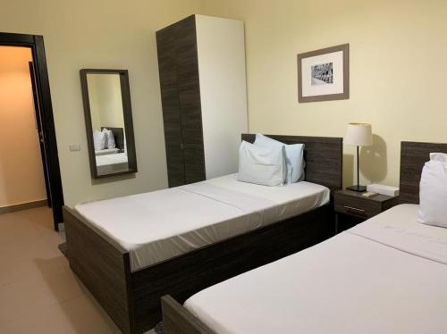 Cama o camas de una habitación en Sakan 275
