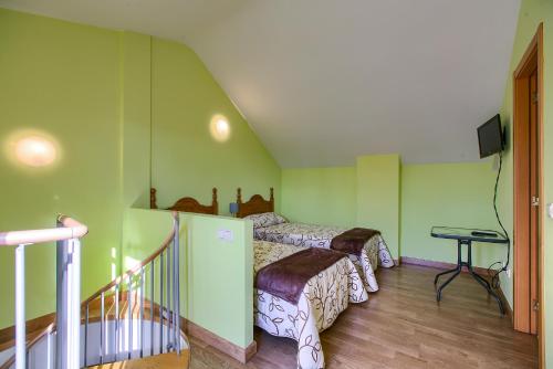 Кровать или кровати в номере Apartamentos Barajas