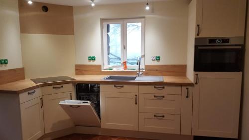 Kuchyň nebo kuchyňský kout v ubytování Domaine de la Boderie