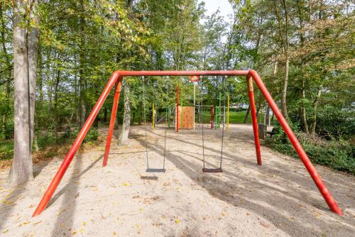 an empty swing set in a park at Hotel Baden-Baden in Baden-Baden