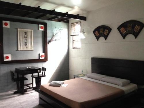 Katil atau katil-katil dalam bilik di Hollywood Drive-In Hotel