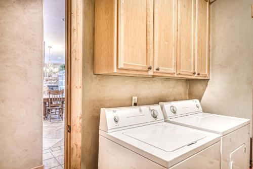 a washer and dryer in a laundry room with a window at Rio Grand Golf Course Home in South Fork