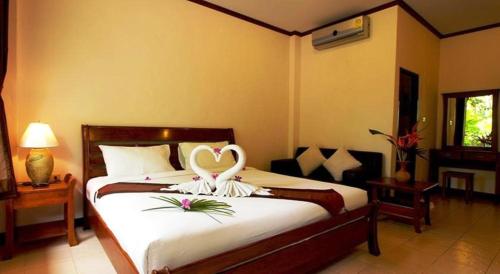 Postel nebo postele na pokoji v ubytování Seabreeze Hotel Kohchang