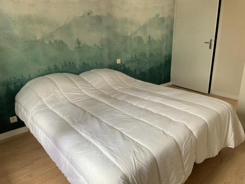 Postel nebo postele na pokoji v ubytování Mimosas
