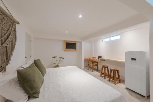 Кровать или кровати в номере Casa Neem