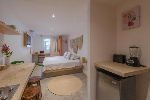 Кровать или кровати в номере Casa Neem