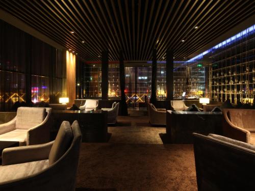 Posezení v ubytování Howard Johnson Parkland Hotel Dalian