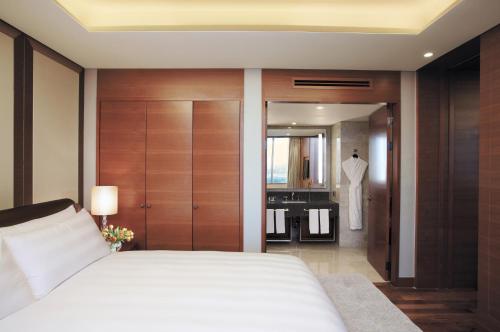 Letto o letti in una camera di LOTTE City Hotel Gimpo Airport