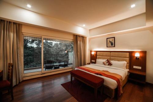Postel nebo postele na pokoji v ubytování Hotel Le Amritam