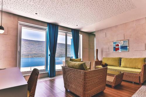 Un lugar para sentarse en Carine Hotel Kumbor Superior