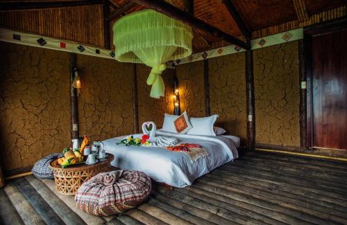 เตียงในห้องที่ Eco Palms House - Sapa Retreat