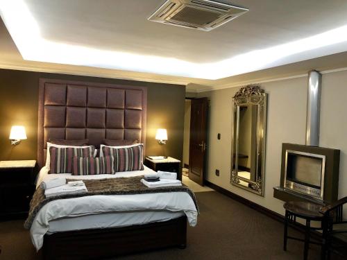 Katil atau katil-katil dalam bilik di Kosmos Lodge