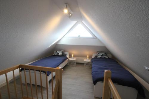 Cama ou camas em um quarto em Ferienhaus Seebrise