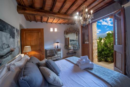 Posteľ alebo postele v izbe v ubytovaní Villa il Vigneto - Homelike Villas