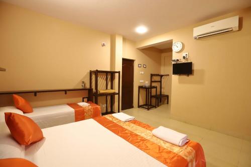 Una cama o camas en una habitación de Dimar Beach Hotel