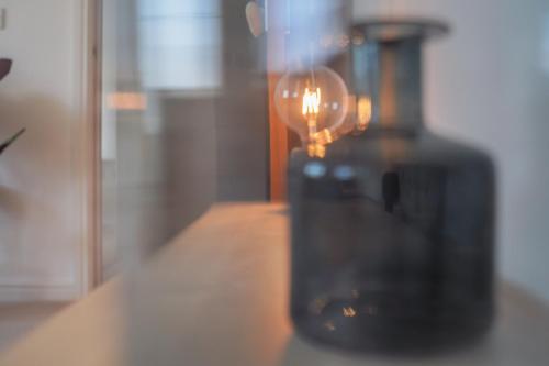 a close up of a blender sitting on a table at Stylish Apartment with Private Parking in Cardiff